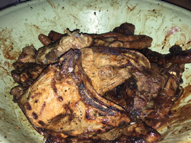 Big bowl of meat, no plate, no silverware, just hands